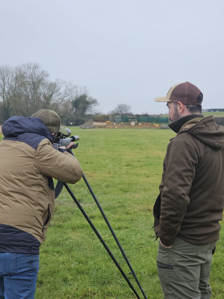 Student taking aim at the rifle range during a PDS Level 1 practical assessment