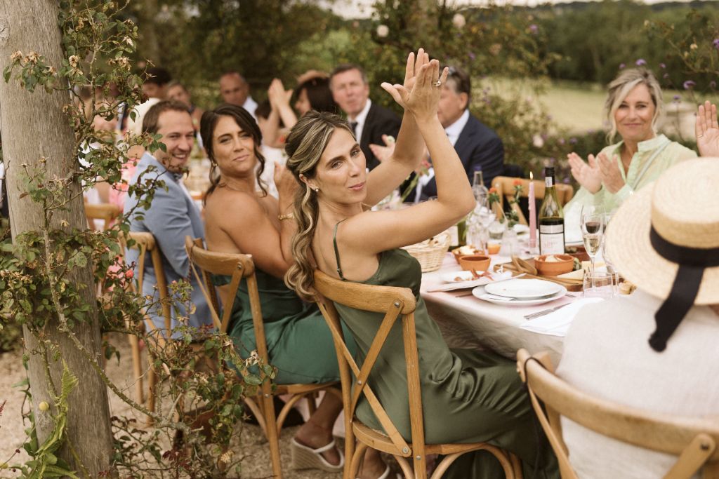 Game and Flames wedding guests dining outdoors
